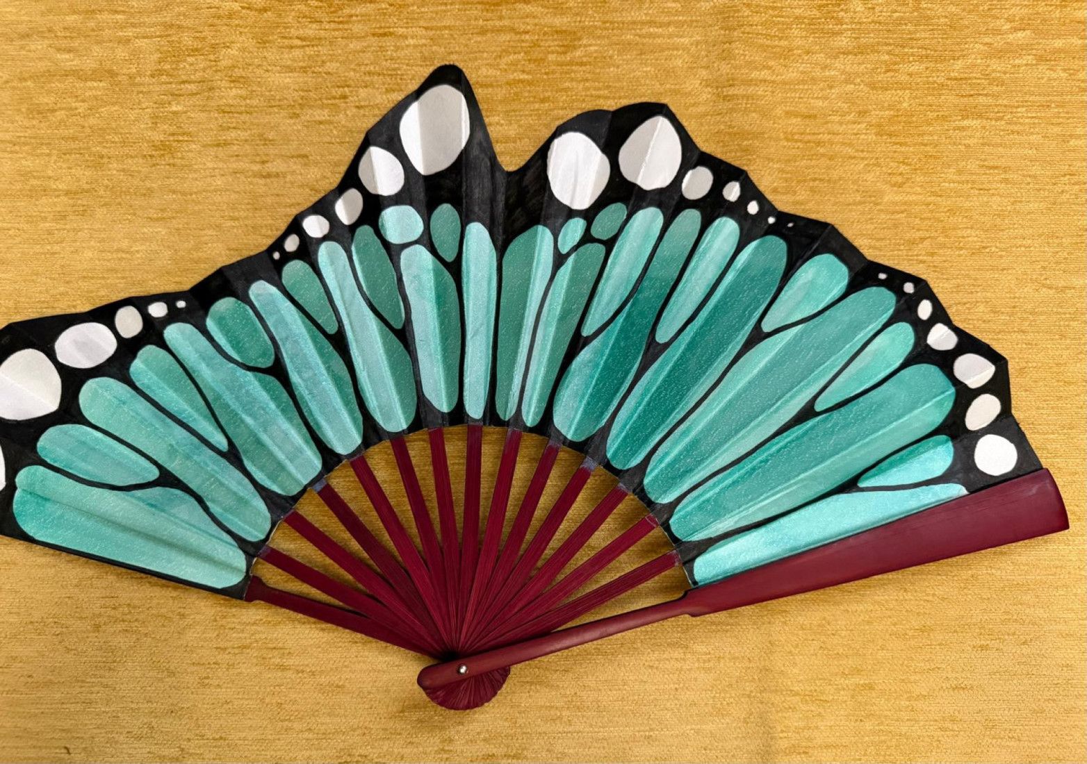 Abanico ala mariposa verde agua